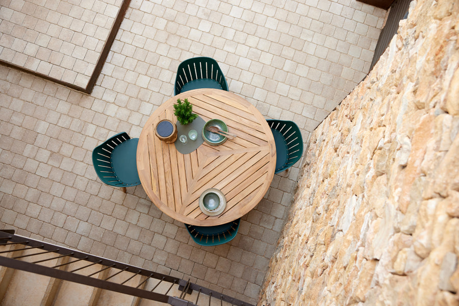 Define Dining Table by Cane-Line, showing define dining table in live shot.
