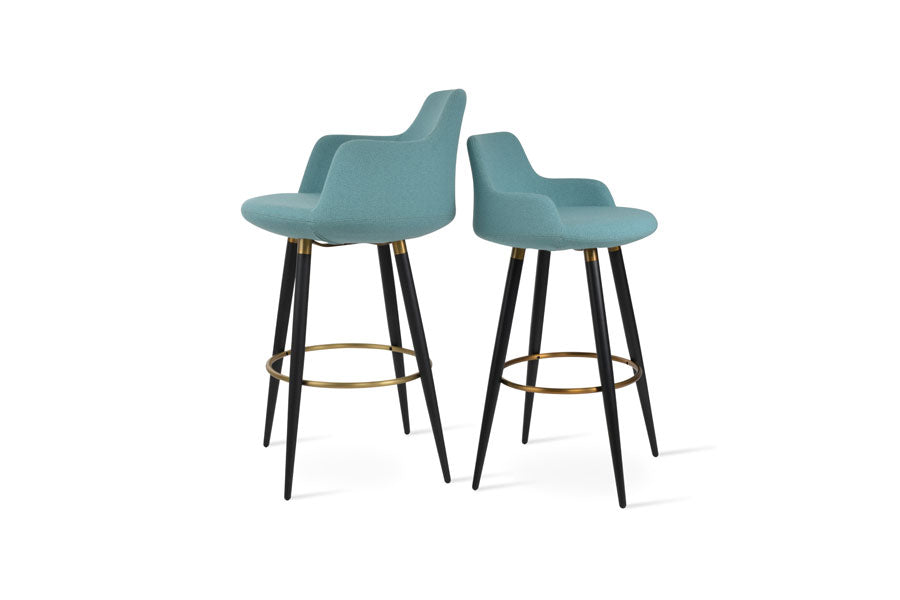 Dervish Ana Stool by SohoConcept, showing angle view of dervish ana stool in black powder steel with brass ring and footrest/camira yoredale green boucle fabric with large ana stool.