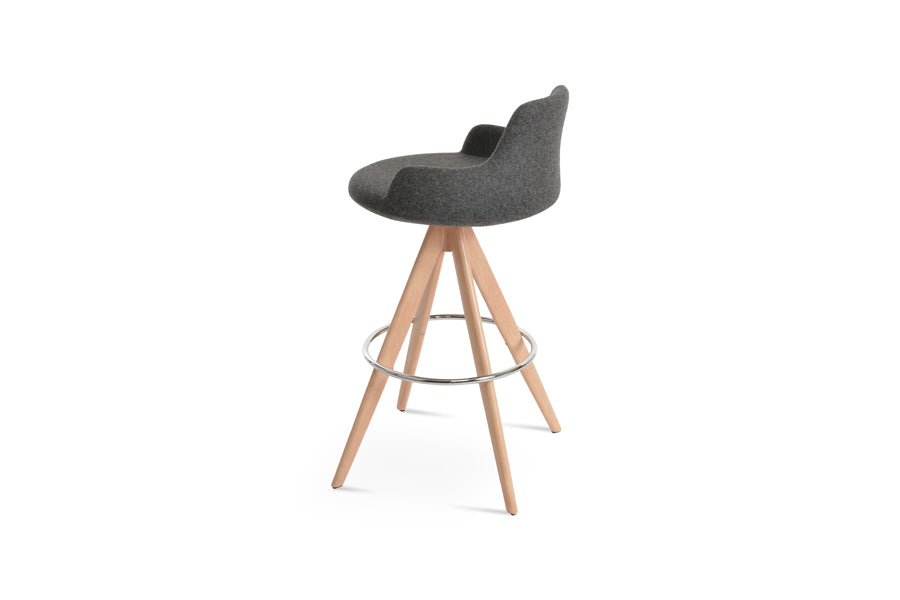 Dervish Pyramid-MW Swivel Stool by SohoConcept, showing side view of dervish pyramid-mw swivel stool in natural veneer legs & chrome footrest/camira blazer dark grey wool.