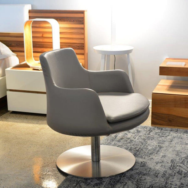 Dervish Swivel Lounge Arm Chair by SohoConcept, showing dervish swivel lounge arm chair in live shot.
