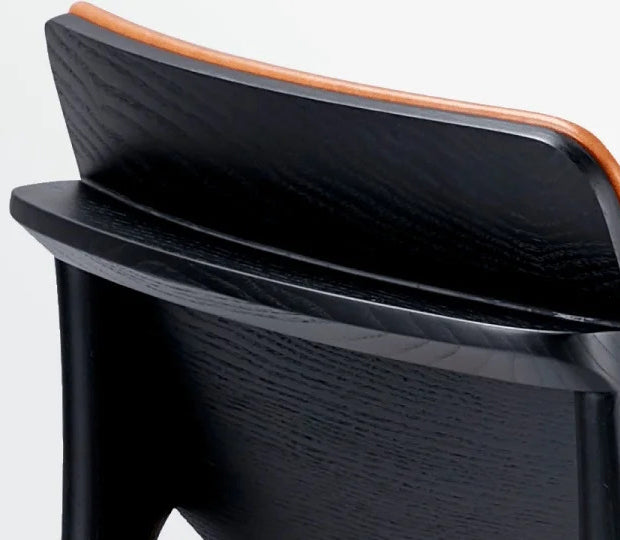 Dion Chair by B&T, showing closeup view of dion chair in live shot.