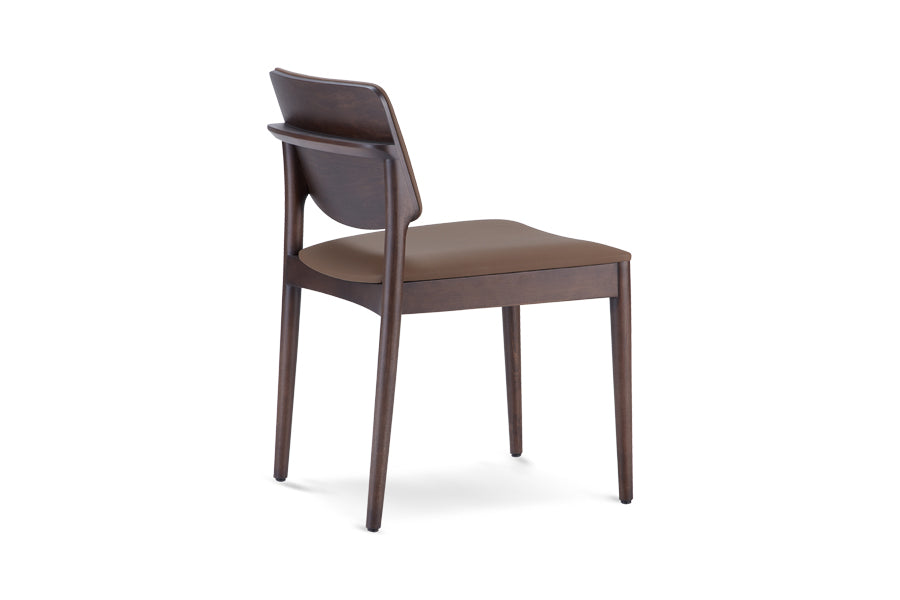 Dion Chair by B&T, showing side view of dion chair in seat upholstered (classic)/ash wood backrest & legs group.