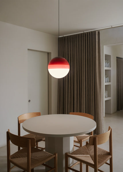 Dipping ø11.8" 30V-24V Pendant Light by Marset, showing dipping ø11.8" 30v-24v pendant light in live shot.