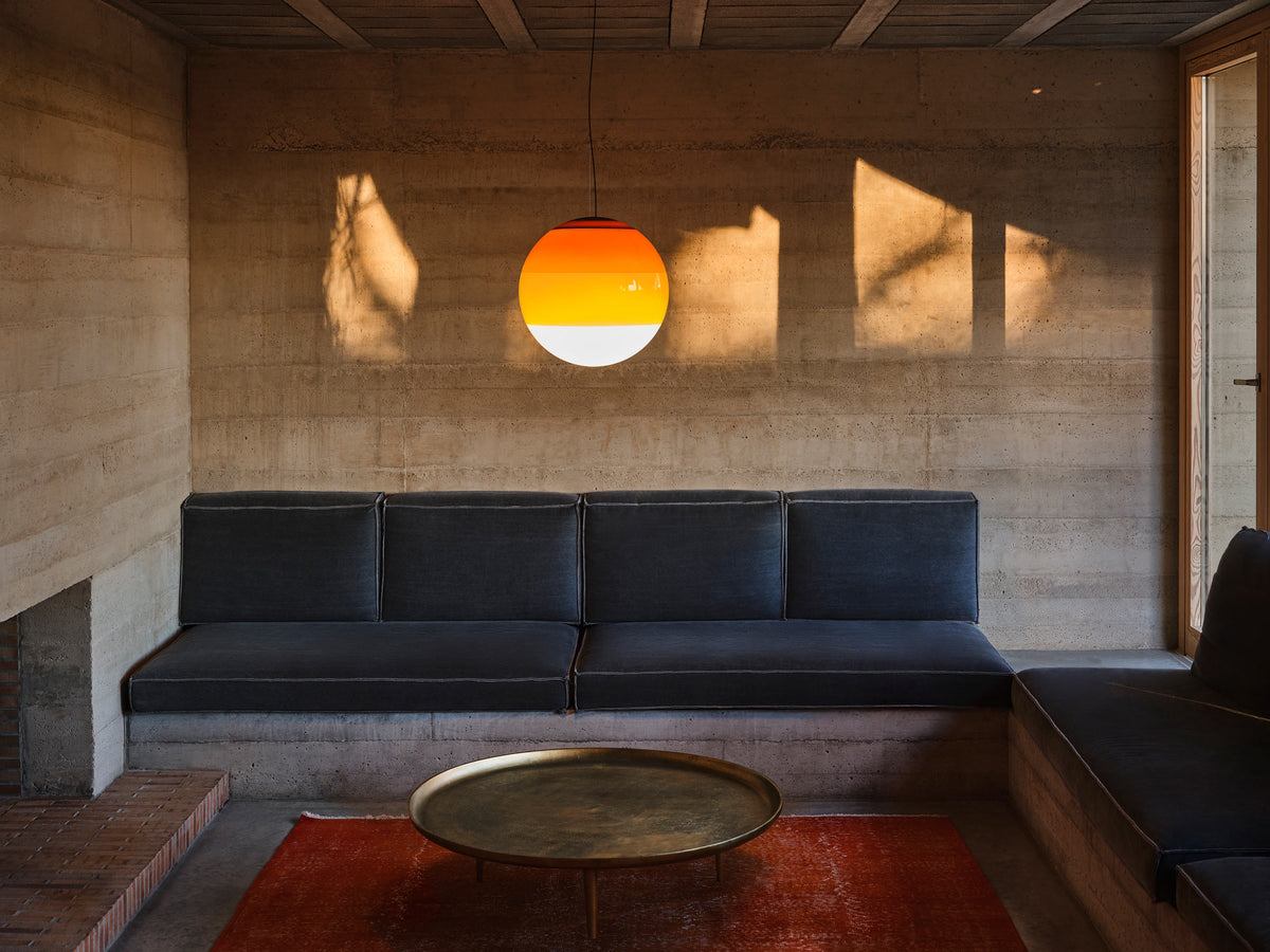 Dipping ø11.8" 30V-24V Pendant Light by Marset, showing dipping ø11.8" 30v-24v pendant light in live shot.