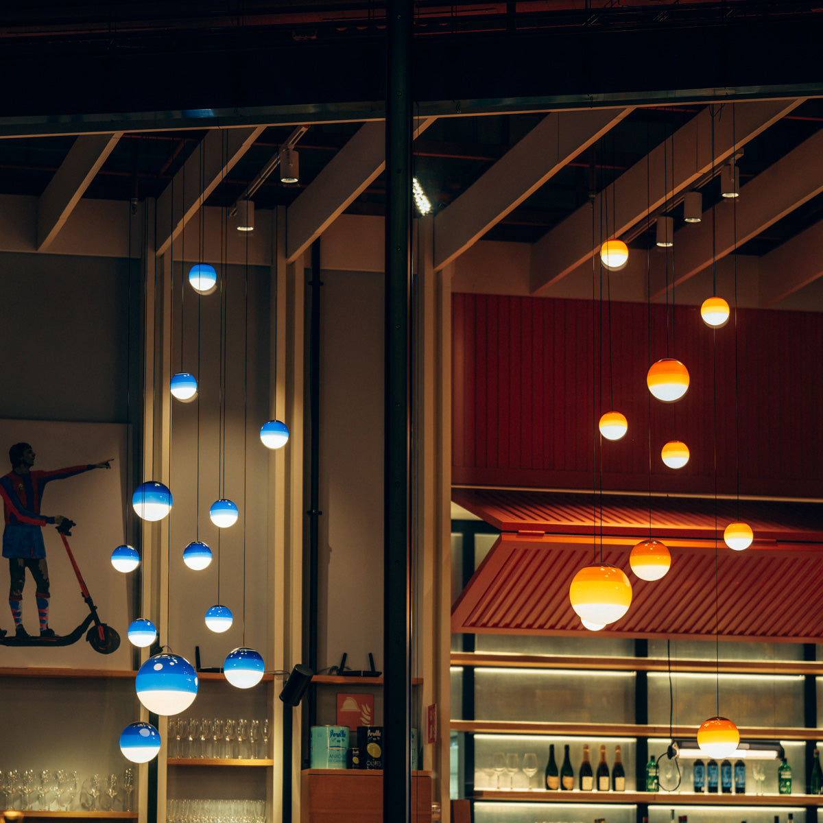 Dipping ø11.8" 30V-24V Pendant Light by Marset, showing dipping ø11.8" 30v-24v pendant lights in live shot.