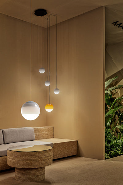 Dipping ø11.8" 30V-24V Pendant Light by Marset, showing dipping ø11.8" 30v-24v pendant lights in live shot.