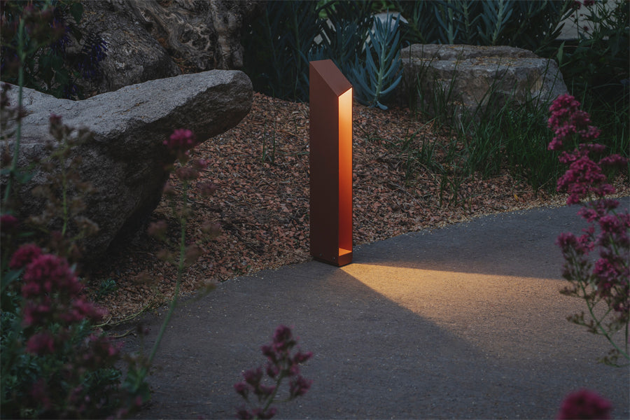 Domus Bollard Outdoor Light by Marset, showing domus bollard outdoor light in live shot.