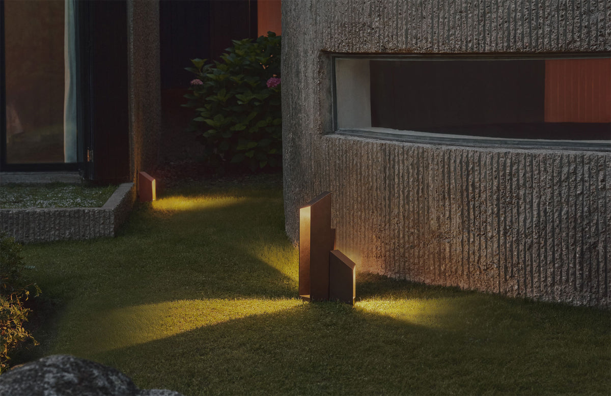 Domus Bollard Outdoor Light by Marset, showing domus bollard outdoor lights in live shot.