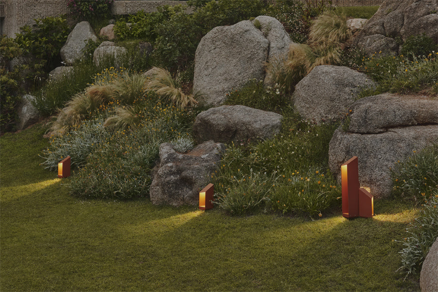 Domus Bollard Outdoor Light by Marset, showing domus bollard outdoor lights in live shot.