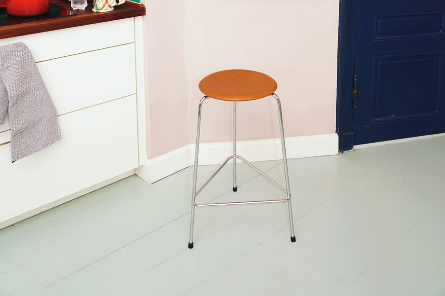 Dot High Stool by Fritz Hansen, showing dot high stool in live shot.