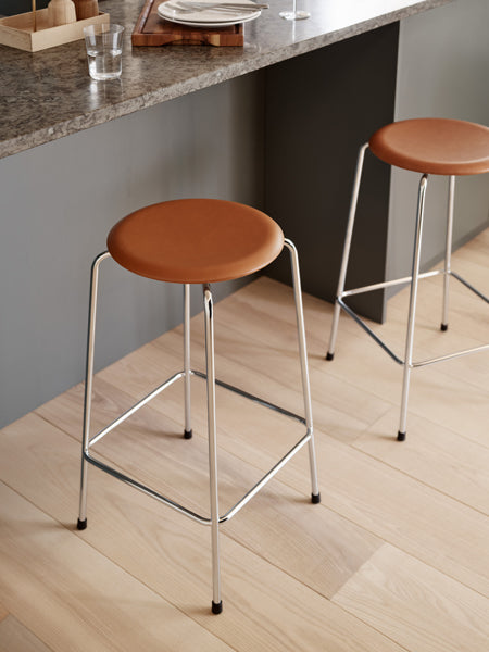 Dot High Stool by Fritz Hansen, showing dot high stools in live shot.