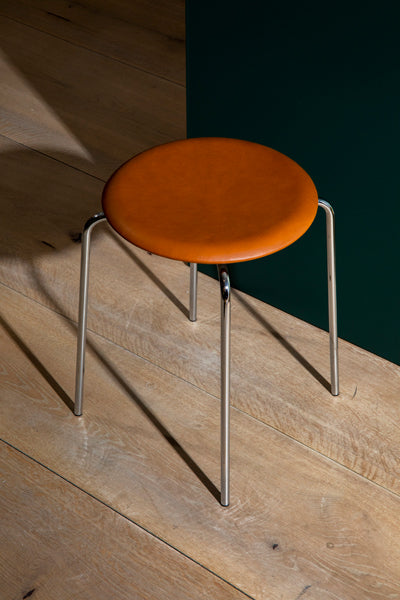 Dot Stool by Fritz Hansen, showing dot stool in live shot.