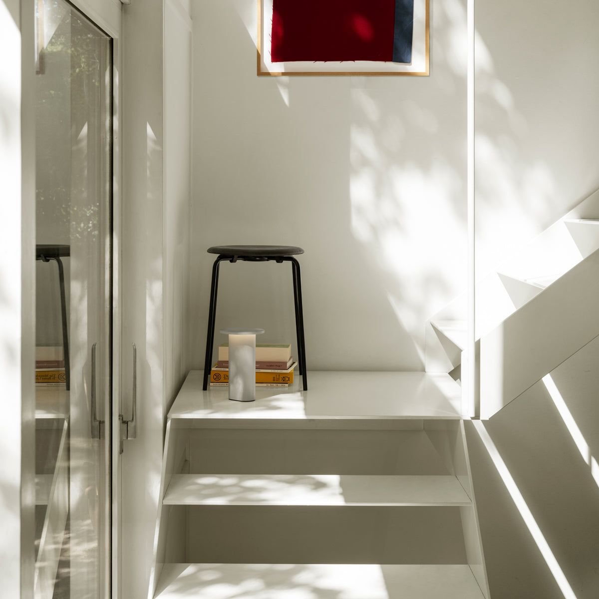 Dot Stool by Fritz Hansen, showing dot stool in live shot.