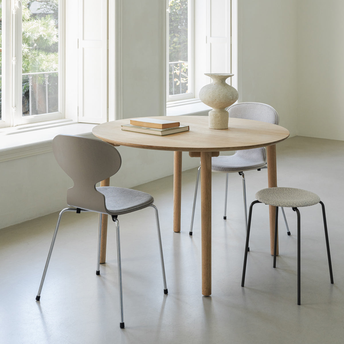 Dot Stool by Fritz Hansen, showing dot stool in live shot.
