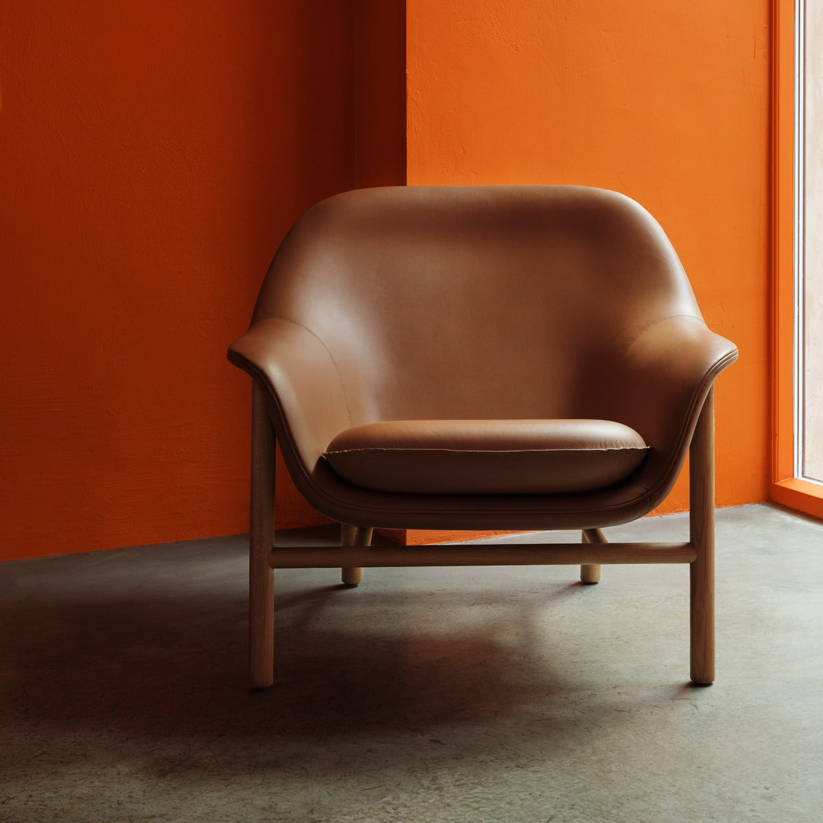 Drape Lounge Chair by Normann Copenhagen, showing drape lounge chair in live shot.