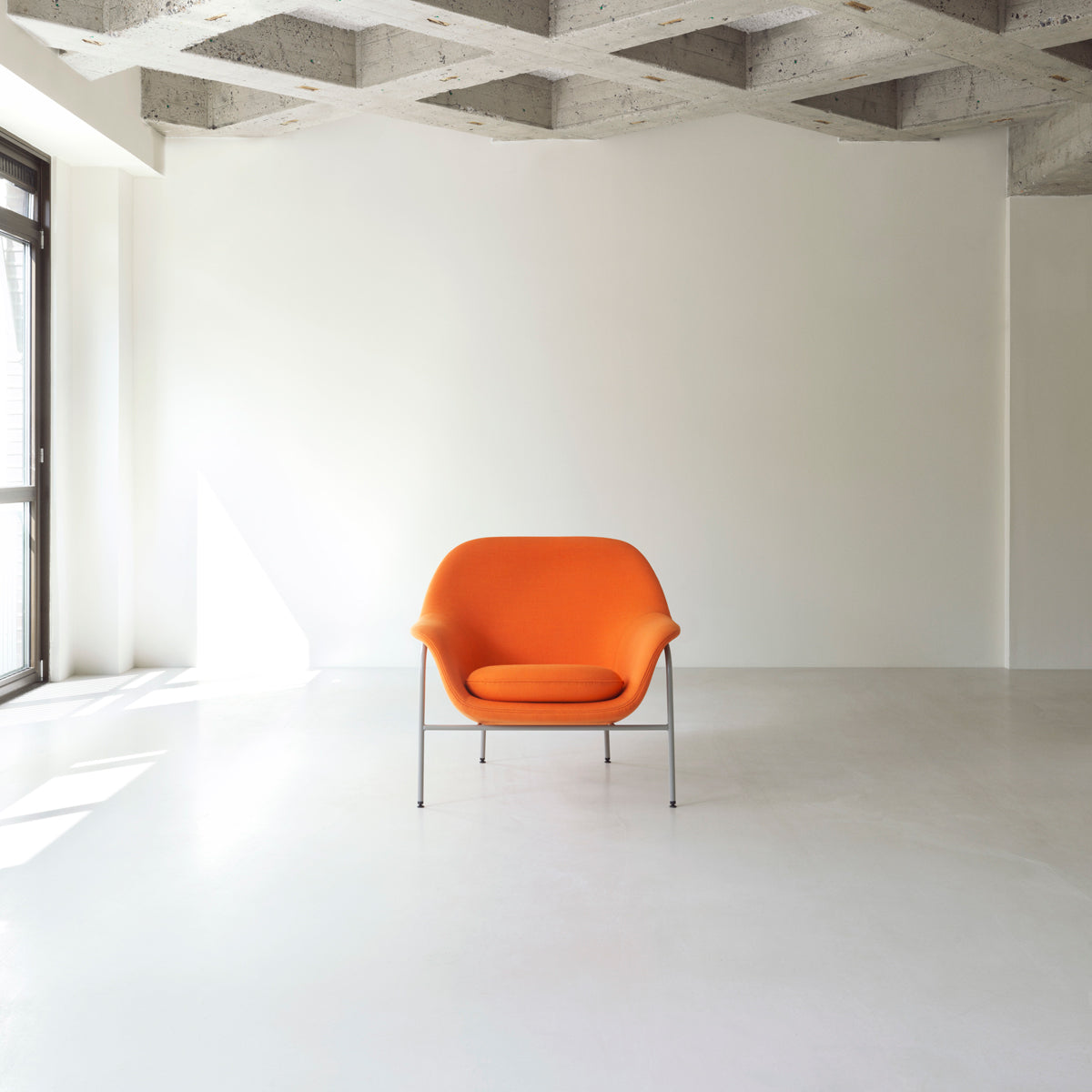 Drape Lounge Chair by Normann Copenhagen, showing drape lounge chair in live shot.