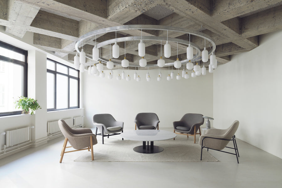 Drape Lounge Chair by Normann Copenhagen, showing drape lounge chairs in live shot.