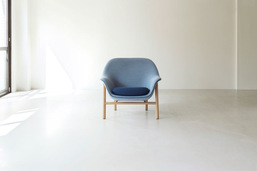 Drape Lounge Chair by Normann Copenhagen, showing drape lounge chair in live shot.