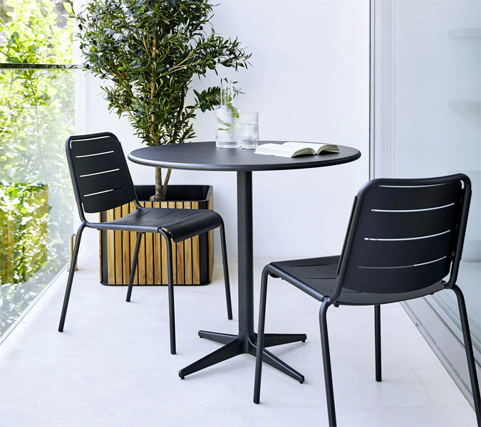Drop 24" Cafe Table by Cane-Line, showing drop 24" cafe table in live shot.