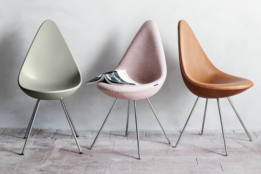 Drop Chair by Fritz Hansen, showing drop chairs in live shot.