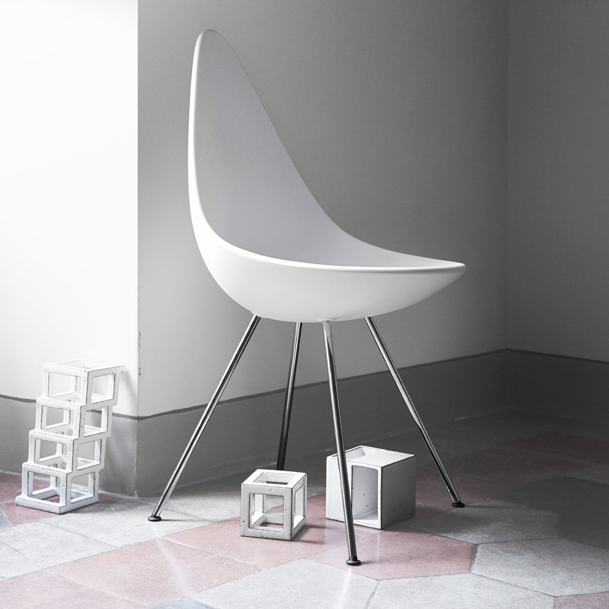 Drop Chair by Fritz Hansen, showing drop chair in live shot.