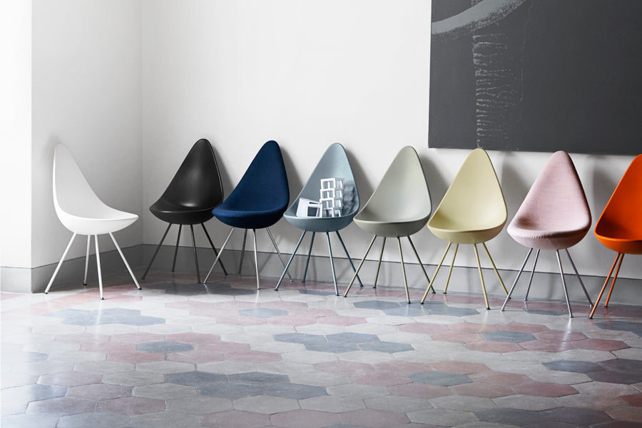 Drop Chair by Fritz Hansen, showing drop chairs in live shot.