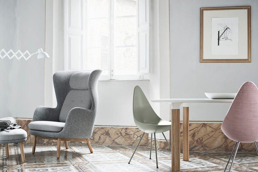 Drop Chair by Fritz Hansen, showing drop chairs in live shot.