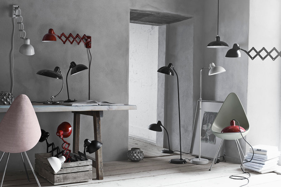 Drop Chair by Fritz Hansen, showing drop chairs in live shot.