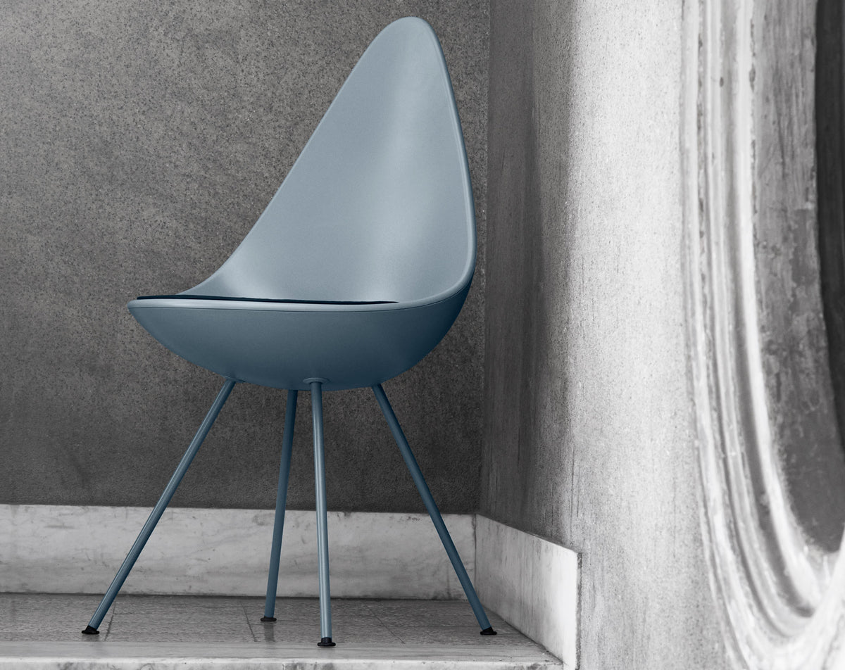Drop Cushion by Fritz Hansen, showing drop cushion with chair in live shot.