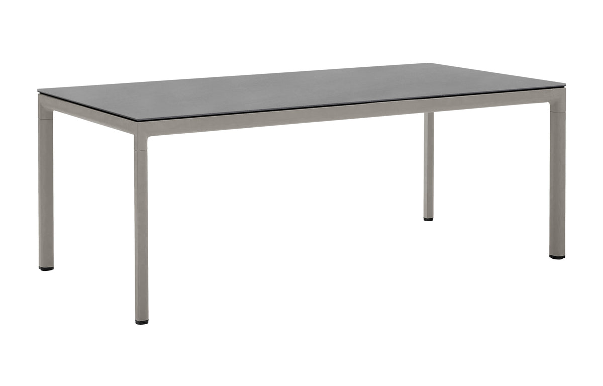 Drop Dining Table by Cane-Line - Taupe Aluminum, Basalt Ceramic.