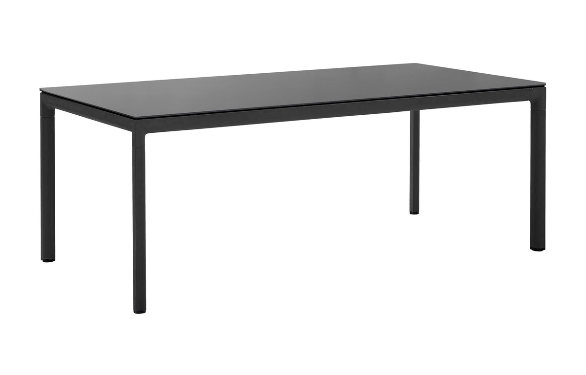 Drop Dining Table by Cane-Line - Lava Grey Aluminum, Nero Black Ceramic.