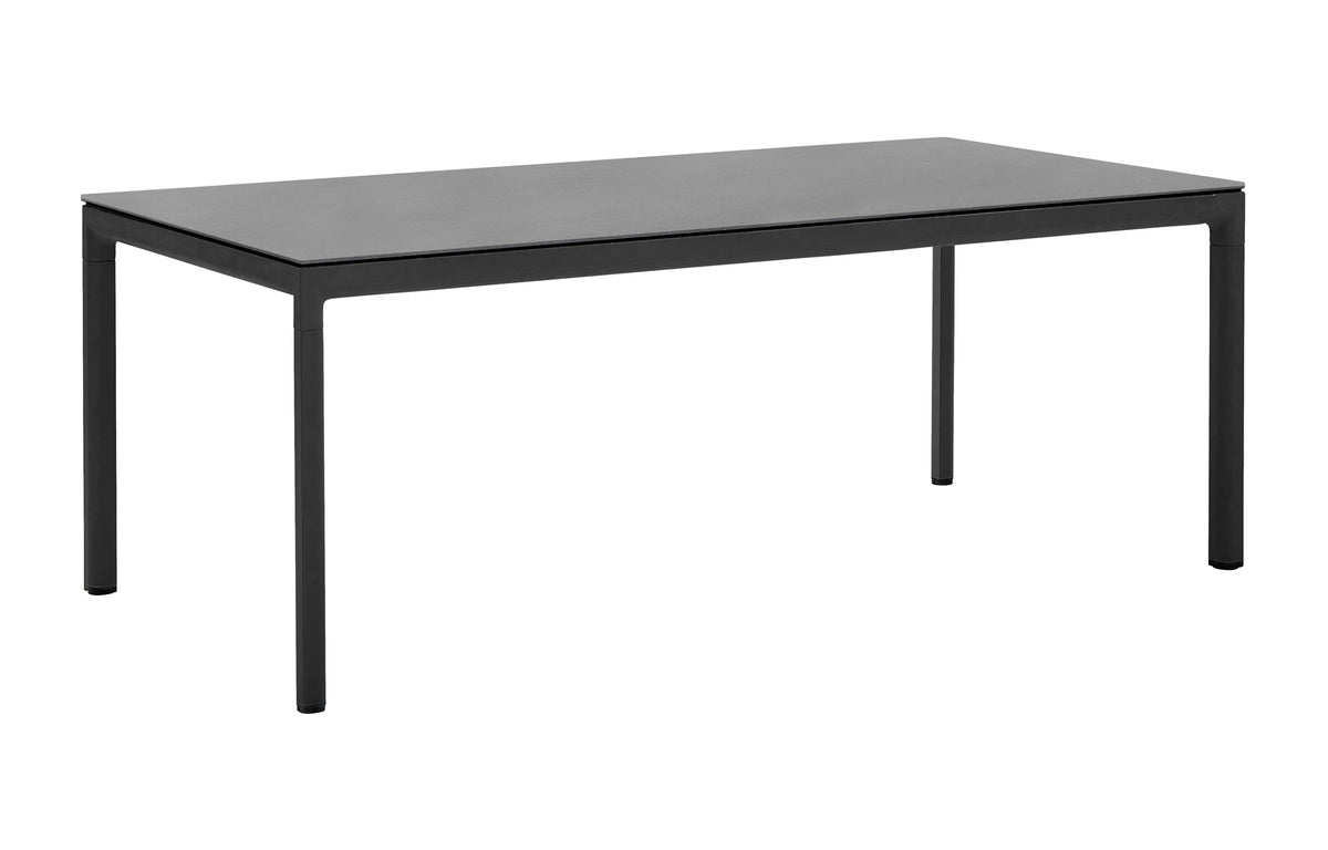 Drop Dining Table by Cane-Line - Lava Grey Aluminum, Basalt Ceramic.