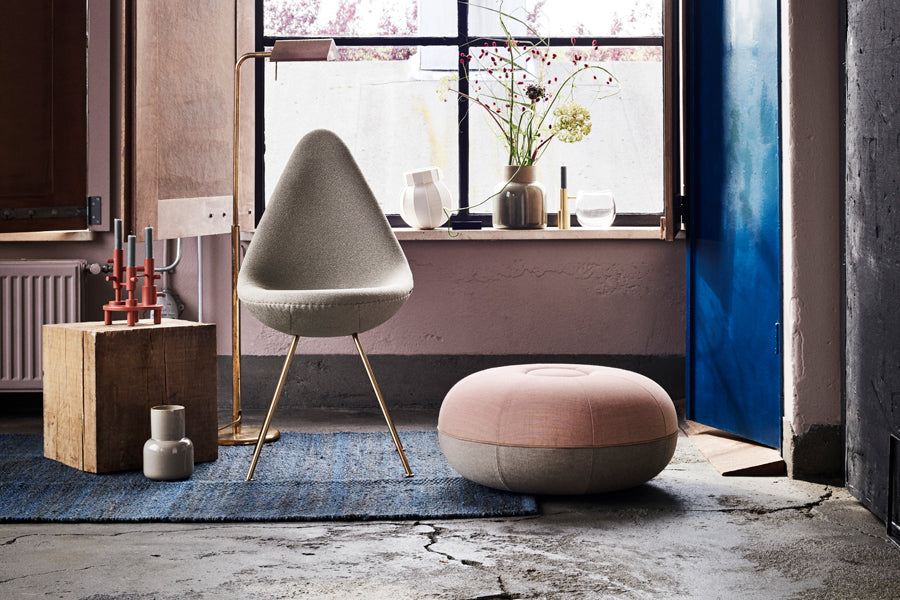 Drop Upholstery Chair by Fritz Hansen, showing drop upholstery chair in live shot.