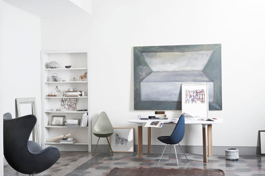 Drop Upholstery Chair by Fritz Hansen, showing drop upholstery chair in live shot.