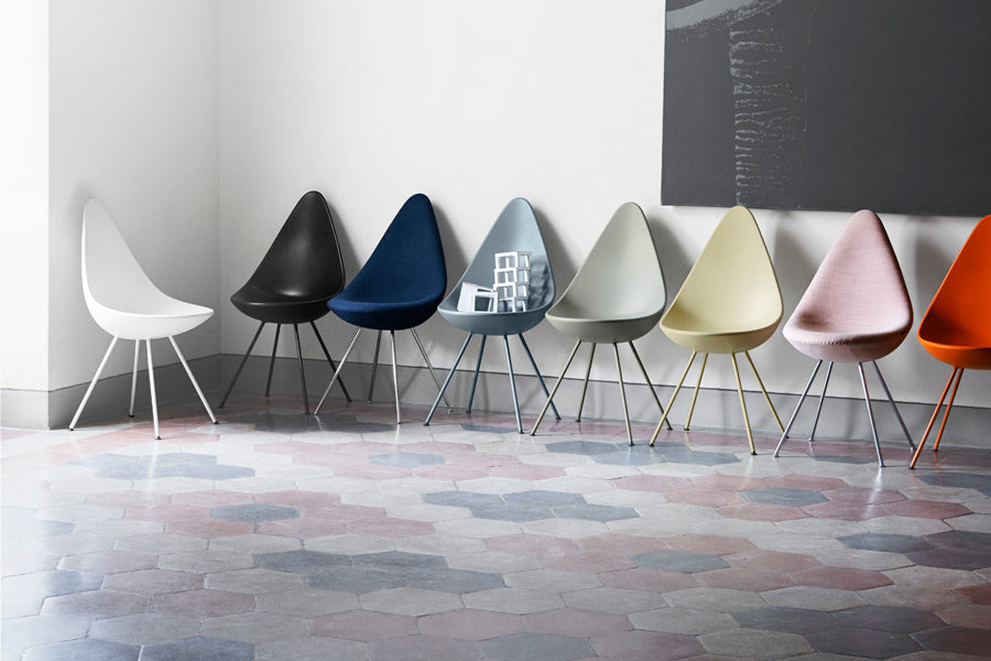 Drop Upholstery Chair by Fritz Hansen, showing drop upholstery chairs in live shot.