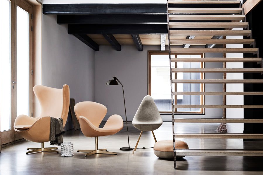 Drop Upholstery Chair by Fritz Hansen, showing drop upholstery chair in live shot.