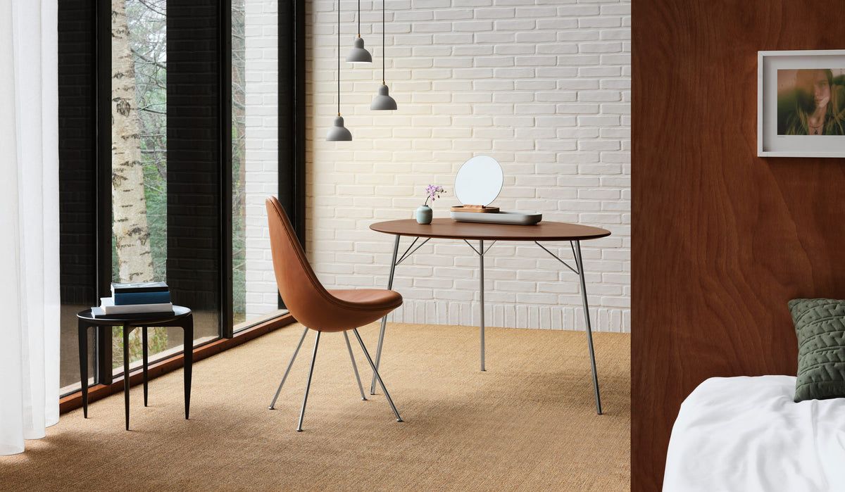 Drop Upholstery Chair with Keder by Fritz Hansen, showing drop upholstery chair with keder in live shot.