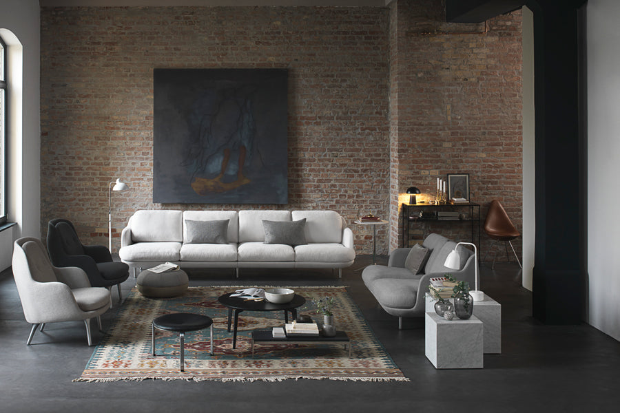 Drop Upholstery Chair with Keder by Fritz Hansen, showing drop upholstery chair with keder in live shot.