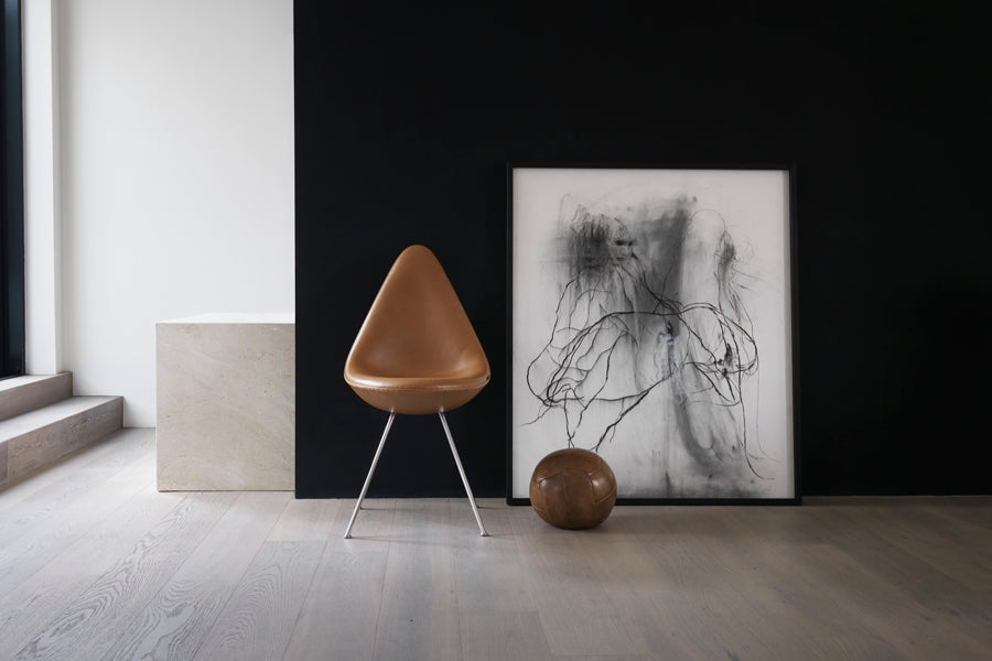 Drop Upholstery Chair with Keder by Fritz Hansen, showing drop upholstery chair with keder in live shot.