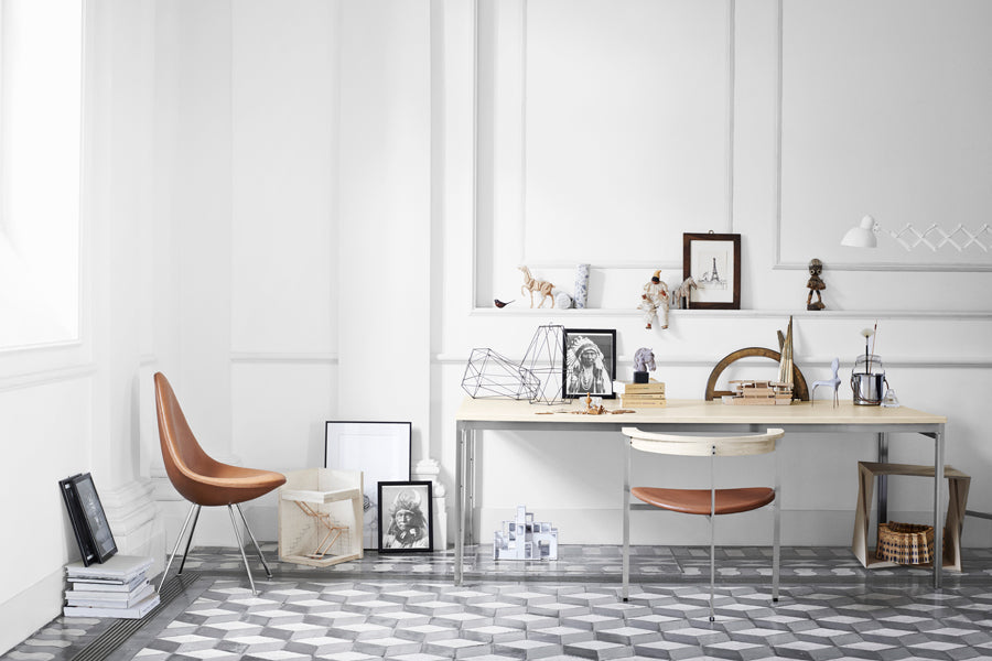 Drop Upholstery Chair with Keder by Fritz Hansen, showing drop upholstery chair with keder in live shot.