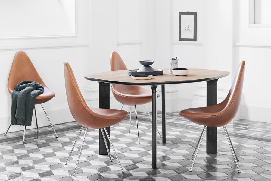 Drop Upholstery Chair with Keder by Fritz Hansen, showing drop upholstery chairs with keder in live shot.