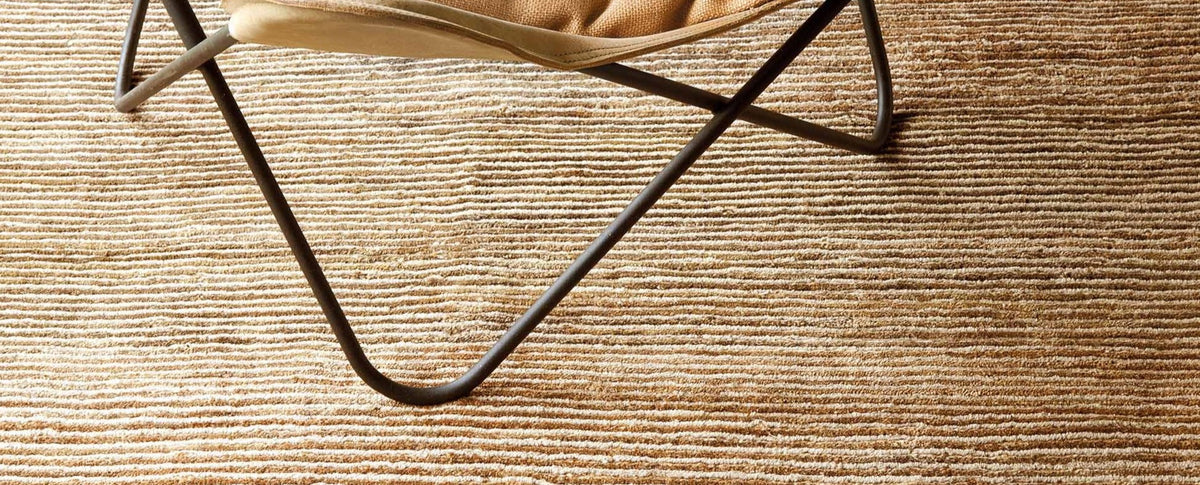 Dune Hand Knotted Rug by Ligne Pure, showing closeup view of dune hand knotted rug in live shot.