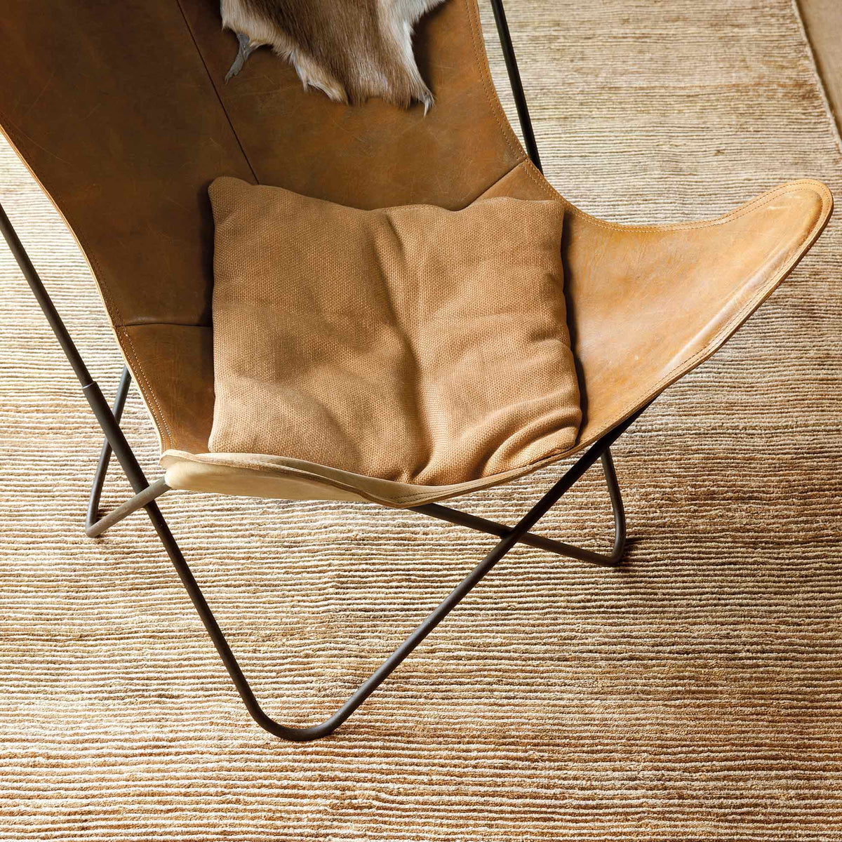 Dune Hand Knotted Rug by Ligne Pure, showing closeup view of dune hand knotted rug in live shot.