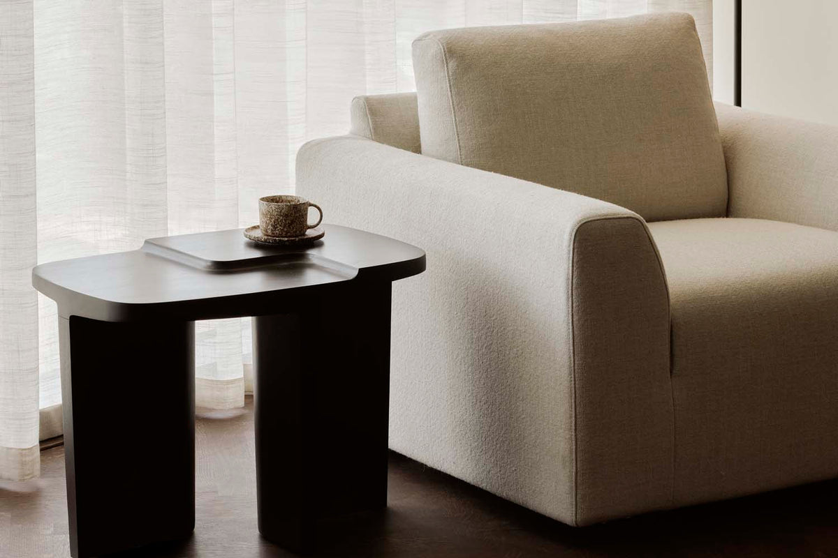 Ease Lounge Chair by Ethnicraft, showing ease lounge chair in live shot.