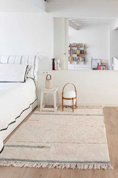 Eco-City Lanes Washable Rug by Lorena Canals, showing eco-city lanes washable rug in live shot.