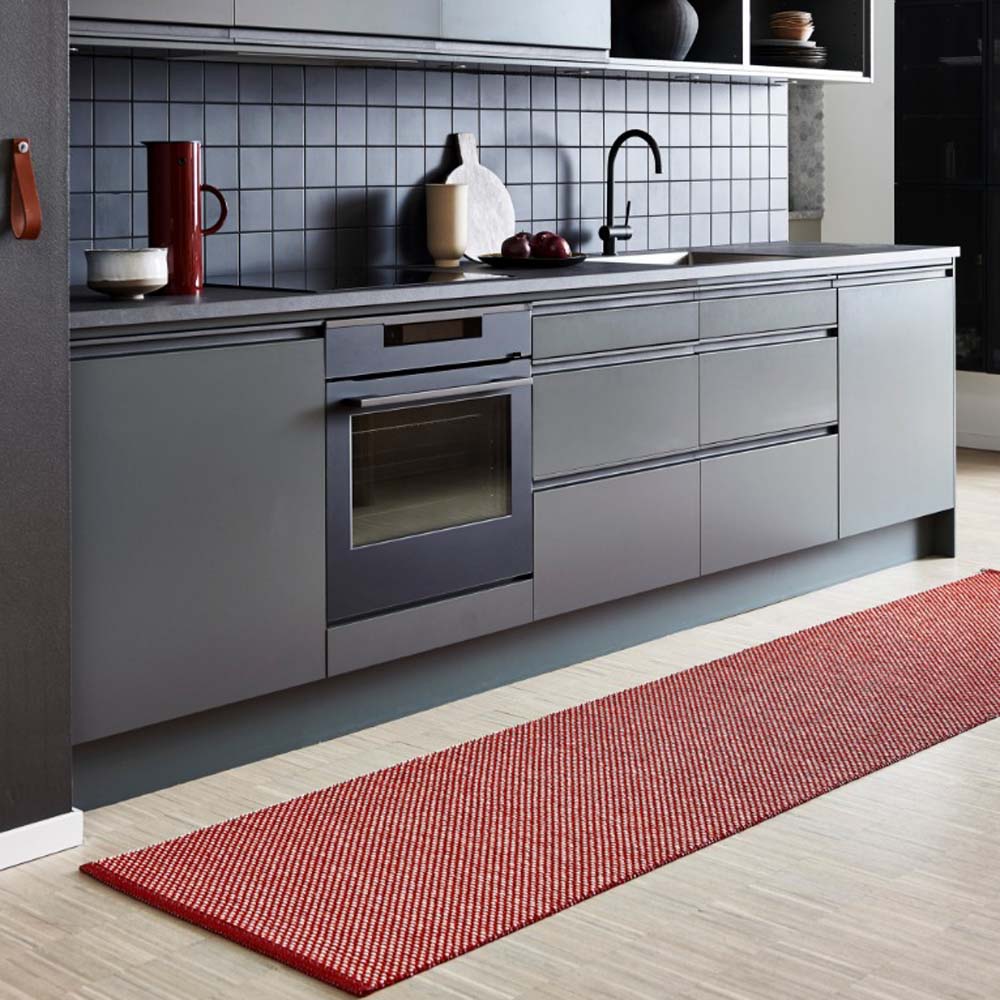 Effi Dark Red & Coral Red with Vanilla Runner Rug by Pappelina, showing effi dark red & coral red with vanilla runner rug in live shot.