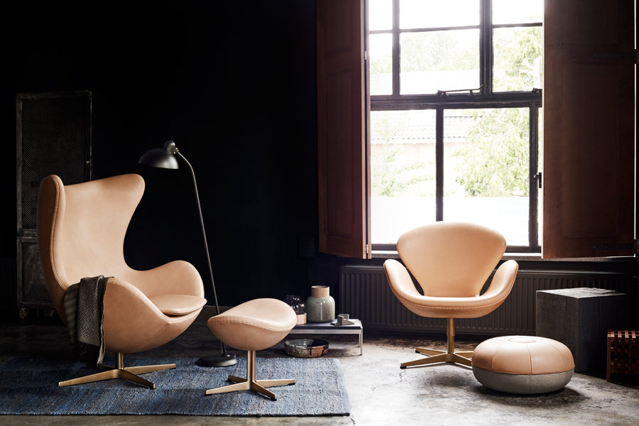 Egg Footstool by Fritz Hansen, showing egg footstool in live shot.