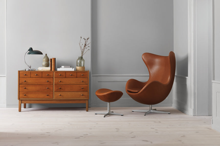 Egg Footstool by Fritz Hansen, showing egg footstool in live shot.