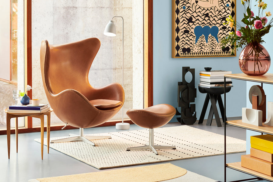 Egg Footstool by Fritz Hansen, showing egg footstool in live shot.