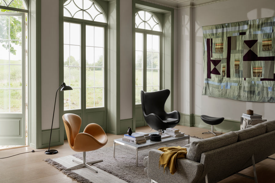 Egg Footstool by Fritz Hansen, showing egg footstool in live shot.